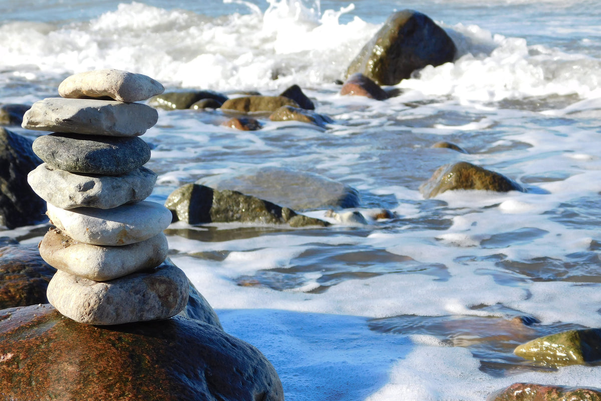 3-piece-aluminium-print-stone-pile-at-the-sea