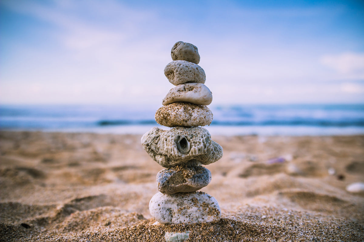 modern-3-piece-canvas-print-stone-pile-on-the-beach
